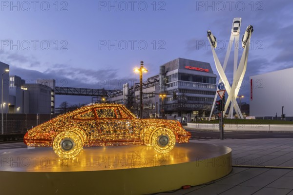 Highlights on Porscheplatz in Zuffenhausen. In front of the Porsche Museum and the car