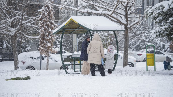 In Gaziantep, Turkey, on December 31, 2025, children and families enjoy winter activities as they