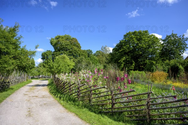 A path along the colorful cottage garden of the famous botanist and taxonomist Carl von Linne with