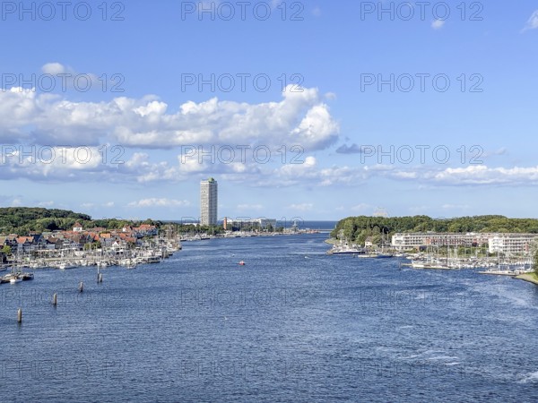 View over the Trave towards the mouth in the underground, the church of Travemünde and the Atlantic