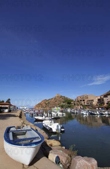 Boats in Port de Porto or Port of Porto on the Porto River, behind the Genoese Tower, Porto, Ota,
