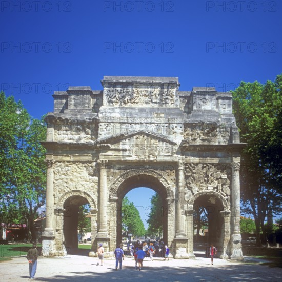 People, children, Arc de Triomphe in Orange, Provence, southern France, June 1999, vintage, retro,