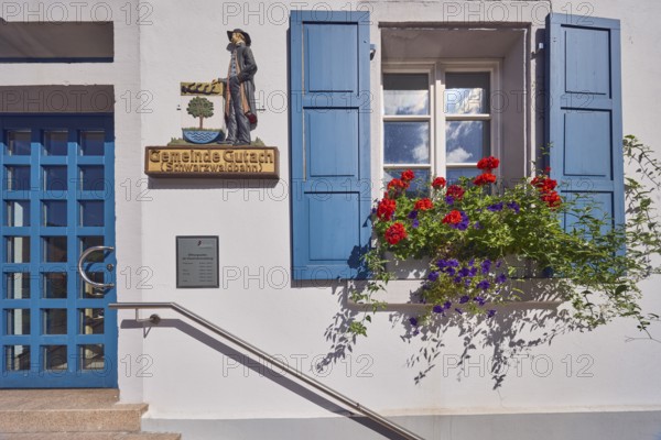 Town hall, municipality of Gutach Schwarzwaldbahn, façade with windows, shutters and entrance door,