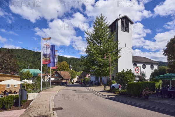 St. Peter and Paul parish church, church tower, flag on the flagpole, 750 years Gutach