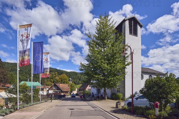 St. Peter and Paul parish church, church tower, flag on flagpole, European flag, 750 years Gutach
