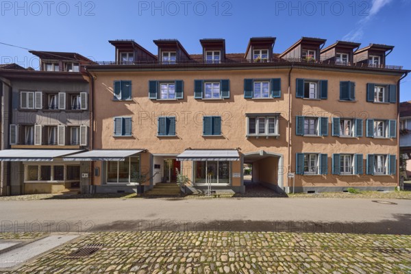Row of houses, historic buildings, residential buildings, dormers, façade with windows, shutters