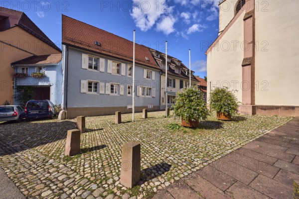 Houses, residential buildings, apartment blocks, church, facade with windows and shutters, dormers,