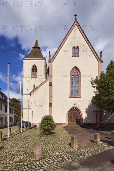 St. Martin parish church, neo-Gothic style, church tower, church tower clock, flagpoles, barrier