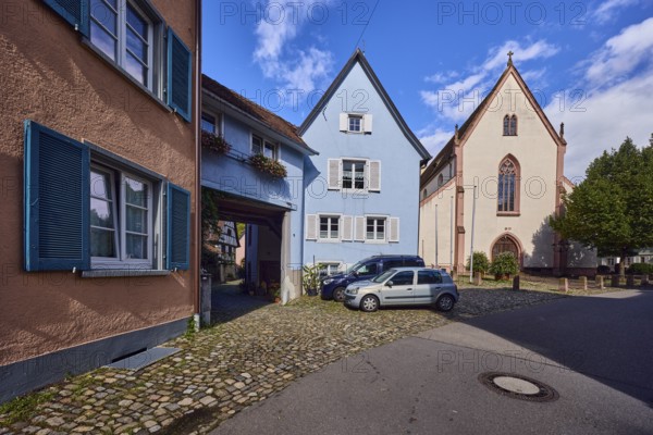St. Martin parish church, houses, historic residential buildings, multi-family houses, road, curve,