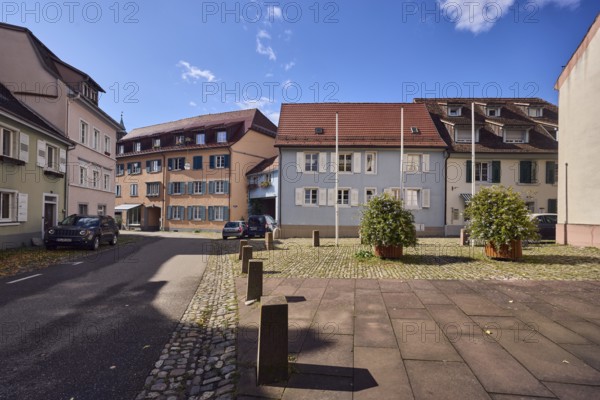 Houses, residential buildings, apartment buildings, façade with windows and shutters, dormers,