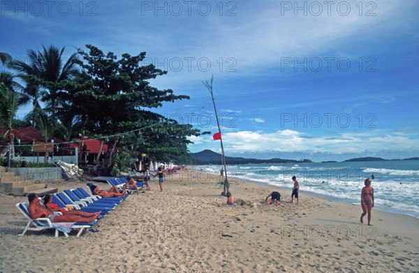 People, deckchairs, Chaweng Beach on Ko Samui, Thailand, December 2002, vintage, retro, old,