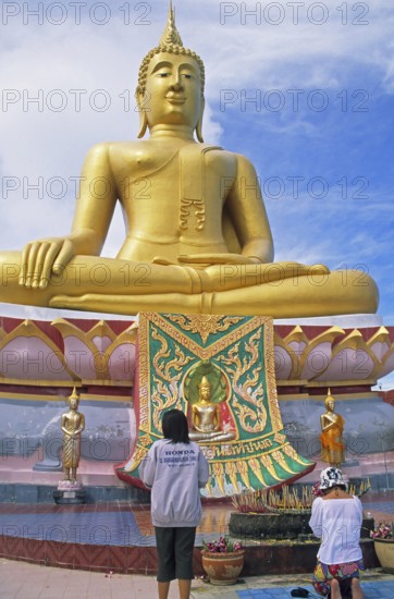 People praying, Big Buddha statue on the island of Ko Samui, Thailand, December 2002, vintage,