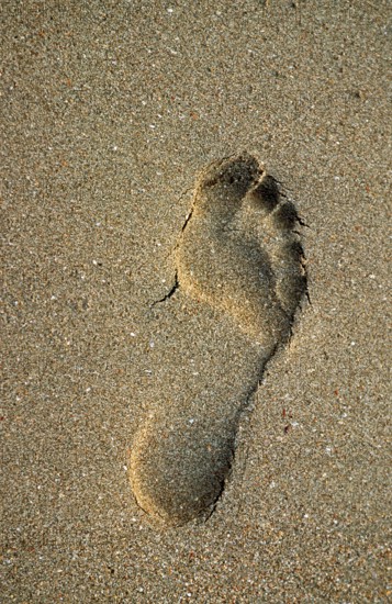 Footprint on the beach on the island of Ko Lanta, Thailand, December 2002, vintage, retro, old,
