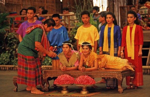 Performance of a traditional wedding ceremony at Rose Garden near Bangkok, Thailand, December 2002,
