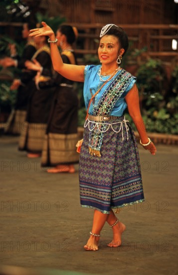 Performance of traditional dances in the Rose Garden near Bangkok, Thailand, December 2002,