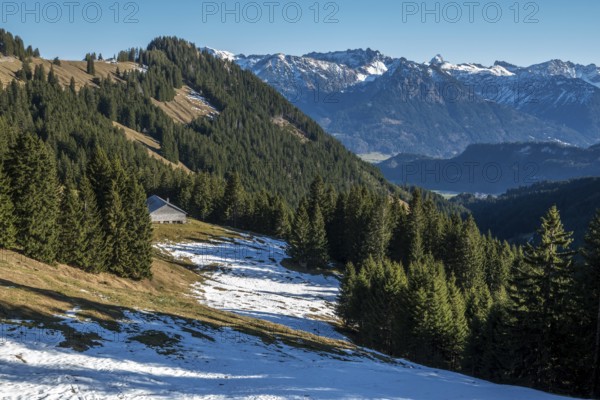 View from the high-altitude hiking trail from Bolsterlanger Horn to Riedberger Horn, snow-capped