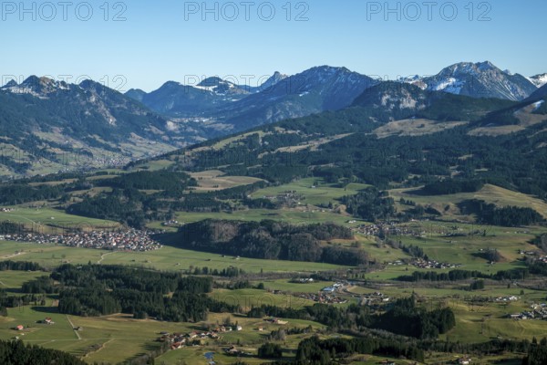View from the Bolsterlanger Horn of villages in the Illertal and mountains of the Allgäu Alps,