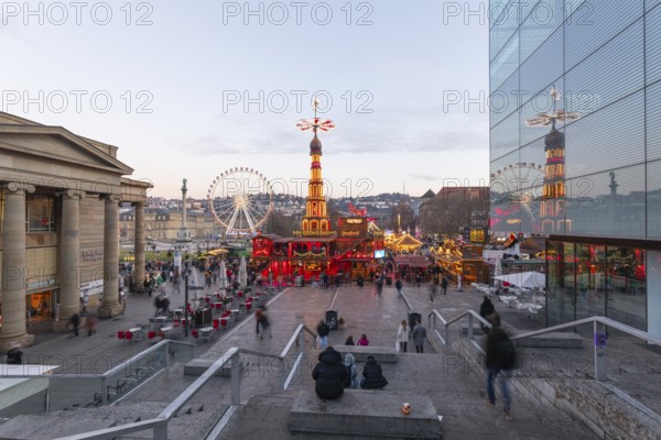 Stuttgart 2025 Christmas market on Schlossplatz with festive lights, a Christmas pyramid, mulled