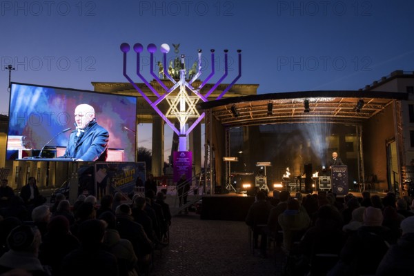 Kai Wegner (Governing Mayor of Berlin) speaks at the lighting of lights to mark 20 years of
