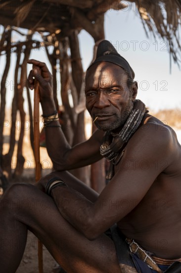Elderly man, leader of the Himba, traditional Himba village, Kaokoveld, Kunene, Namibia