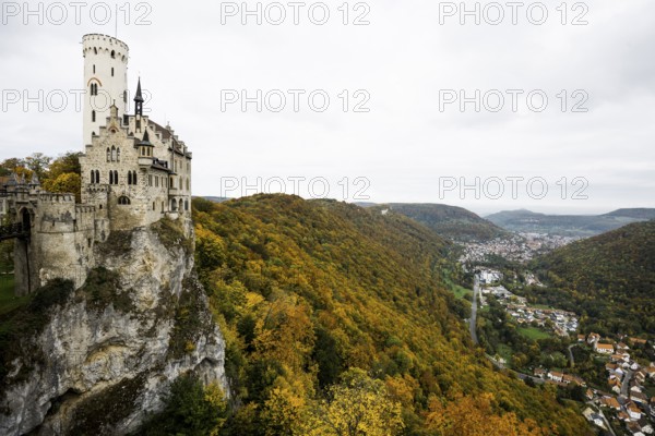 Castle and autumnal forest, Lichtenstein Castle, Honau, Echaz Valley, Swabian Jura,