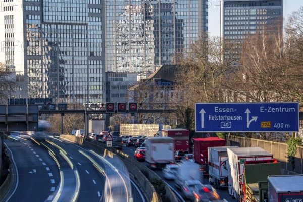 The A40 motorway, Ruhrschnellweg, in Essen, city skyline, Evonik office building, traffic jam in
