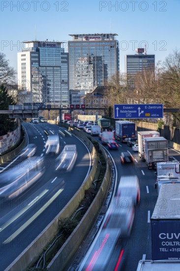 The A40 motorway, Ruhrschnellweg, in Essen, city skyline, Evonik office building, traffic jam in