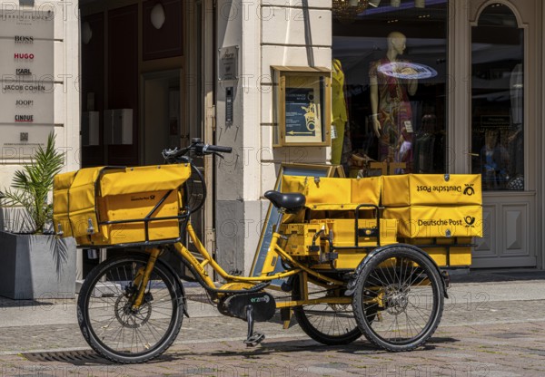 Deutsche Post bicycle loaded with luggage, letter and parcel delivery, Potsdam, Brandenburg,