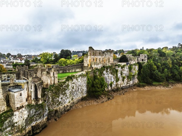 Autumn over Chepstow Castle and River Wye from a drone, Chepstow, Monmouthshire, Wales, UK