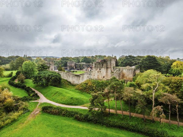 Autumn Colours over ruins of Caldicot Castle from a drone, Caldicot, Monmouthshire, Wales, UK