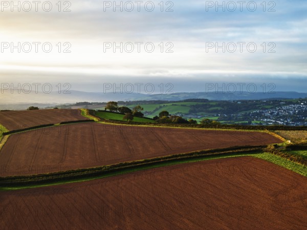 Colours of autumn Fields and Farms over Sheldon from a drone, Torbay, Devon, England, United