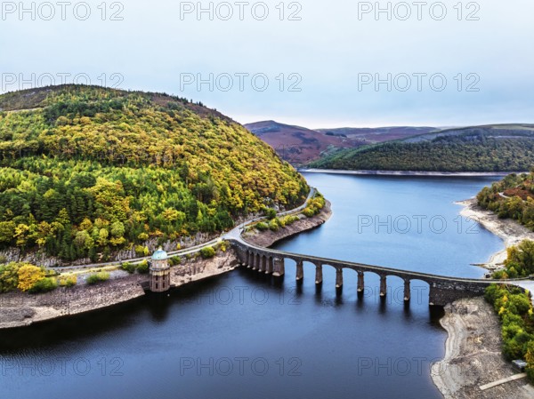 Autumn over Garreg Ddu Dam from a drone, Elan Valley, Caban-Coch Reservoir, Rhayader, Wales, UK