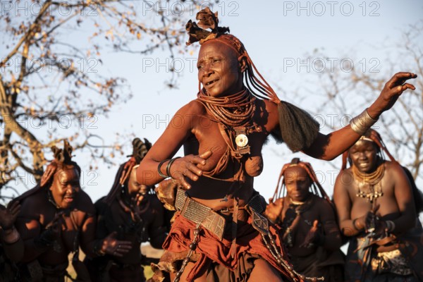 Himba woman dancing euphorically, traditional dance, traditional Himba village, Kaokoveld, Kunene,