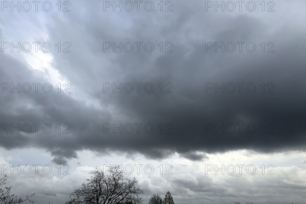 Large grey cloud roller Stratocumulus cluster layer cloud during high winter conditions,