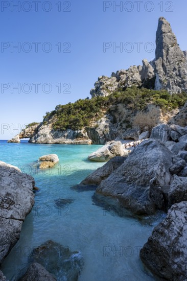 Light blue clear sea on a dream beach on Cala Goloritzé, picturesque rocky coast, steep coast with
