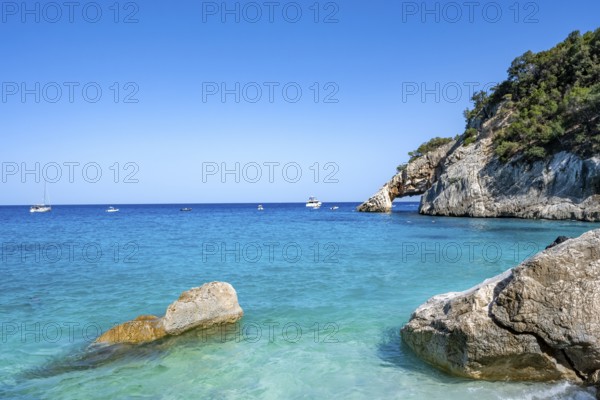 Light blue clear sea on a dream beach on Cala Goloritzé, picturesque rocky coast, cliffs with rock