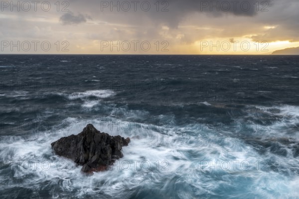 Sunrise, waves and rocks, coast near Porto Moniz, Madeira, Portugal