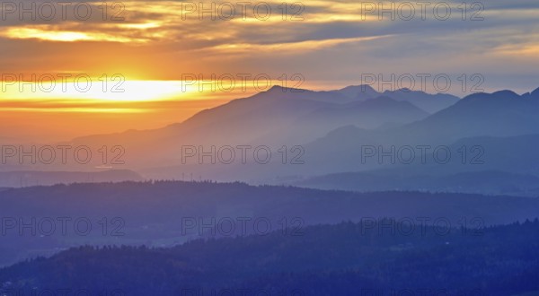 View of the Jura foothills from the Gisliflue, in the light of the setting sun, Talheim, Canton,