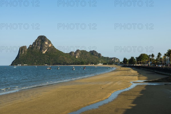 Lonely sandy beach and mountains, sunset, Prachuap Khiri Khan, Prachuap Khiri Khan Province,