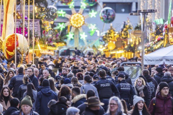 Busy shopping street in Stuttgart. Police patrol in the midst of the crowds. On the first weekend
