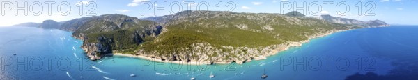 Panorama, picturesque rocky coast, cliffs and Cala Luna beach, aerial view, Golfo di Orosei,