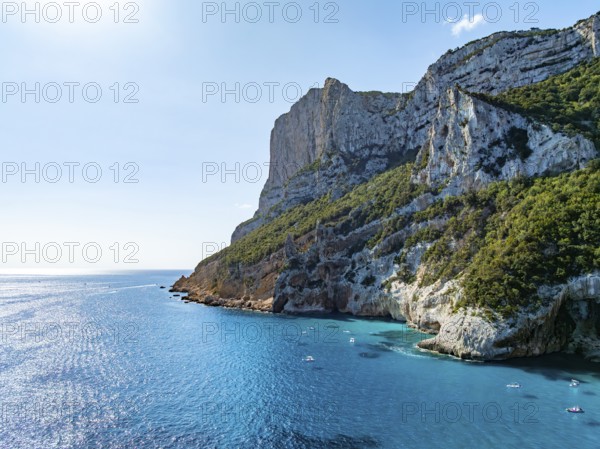 Picturesque rocky coast, cliffs and turquoise blue sea, aerial view, Golfo di Orosei, Baunei,