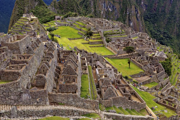 Rocky ruins and expansive terraces in an ancient setting, the ruins of the Inca city of Machu