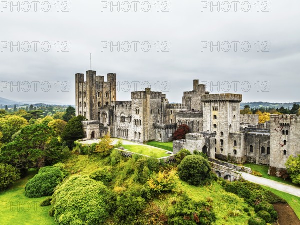 Autumn colours over Penrhyn Castle and Garden from a drone, Llandygai, Bangor, Gwynedd, North