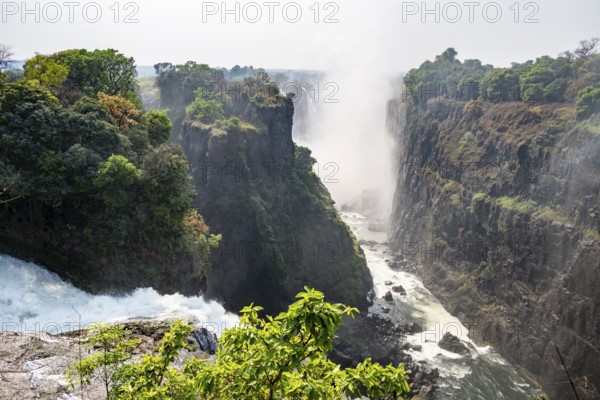 Water plunges into the depths, Victoria Falls with gorge, Zambezi, Zimbabwe