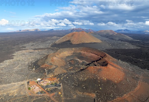 Montaña Quemada and Montaña Pedro Perico volcanoes, volcanic landscape with craters and lava