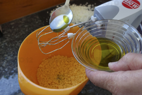 Southern German cuisine, preparing aioli, garlic cream, mayonnaise, oil and minced egg, men's