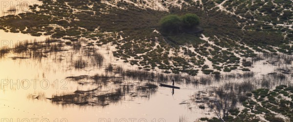 Marshland, marshland, Kavango fishermen with dugout boat, Mokoro, aerial view, Okavango Delta,