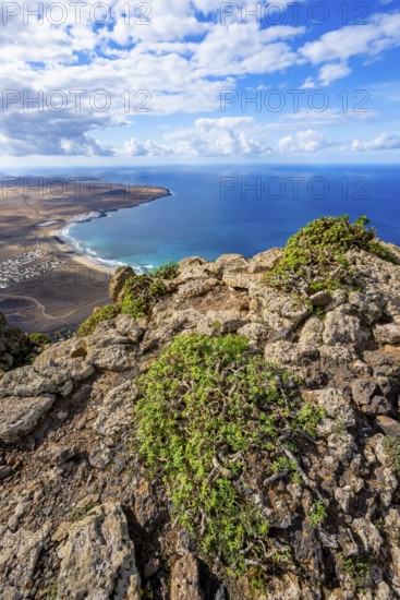 Castillejo viewpoint, view from the Risco de Famara cliffs to the coast and the sea with the Famara