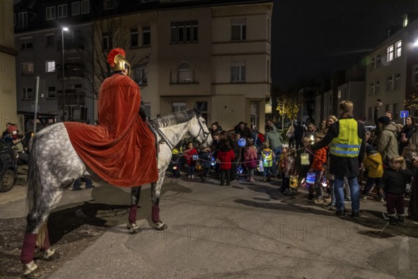 Martinszug in Essen-Rüttenscheid, the parish of St. Lambertus, Saint Martin actor on a horse, with